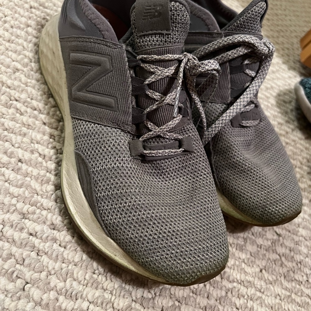 Grey New Balance tennis shoes